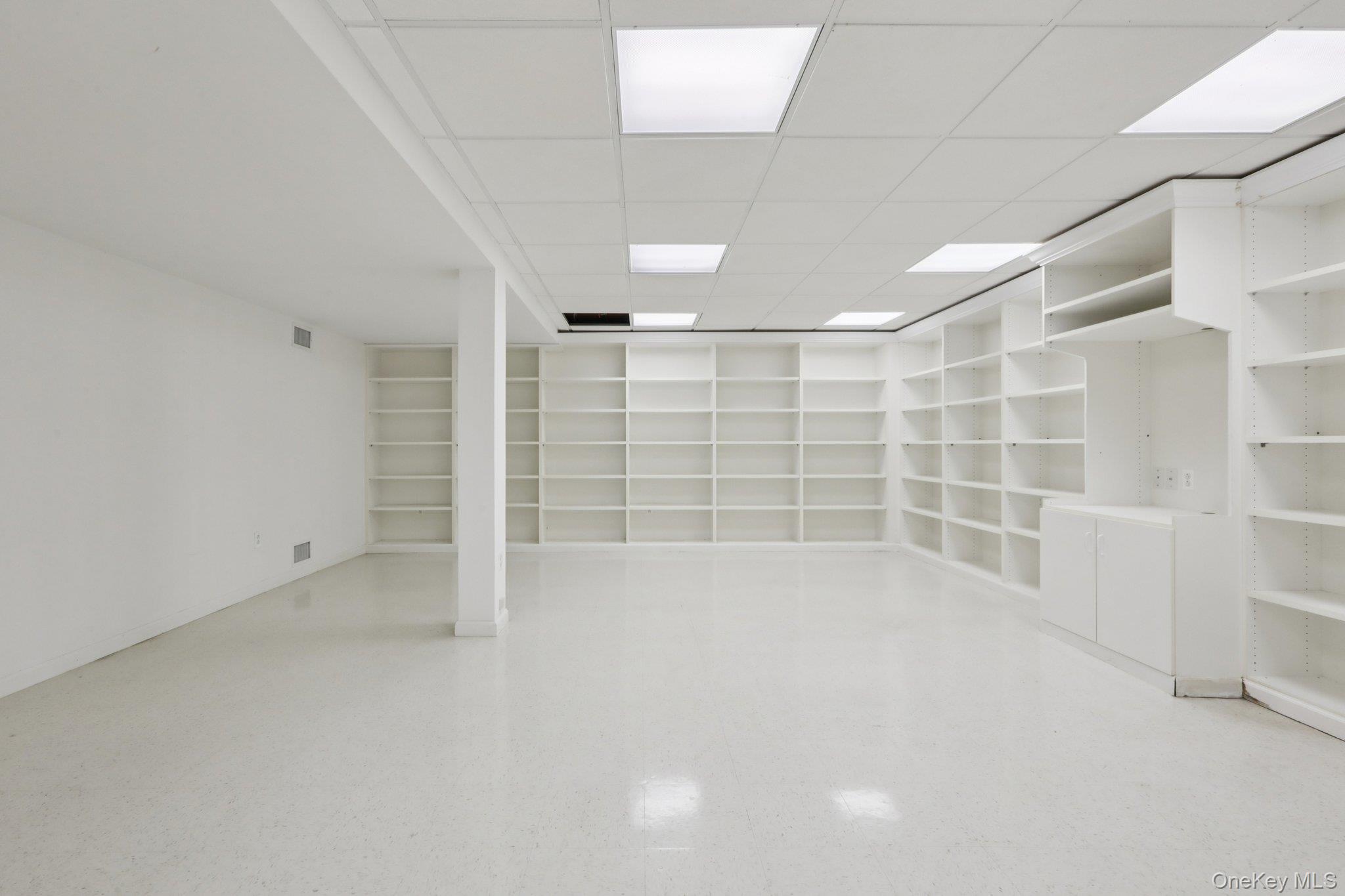 17 Rolling Ridge Road New City, NY 10956 - Photo 38 of 50 Huge finished basement with built in shelving Perfect for in home business or In law suite.