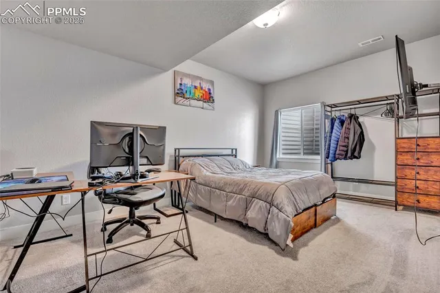 a view of an empty room with stairs