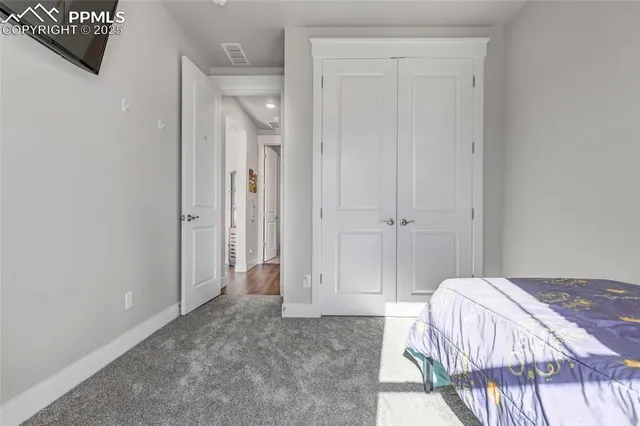 a view of a house with backyard porch and sitting area