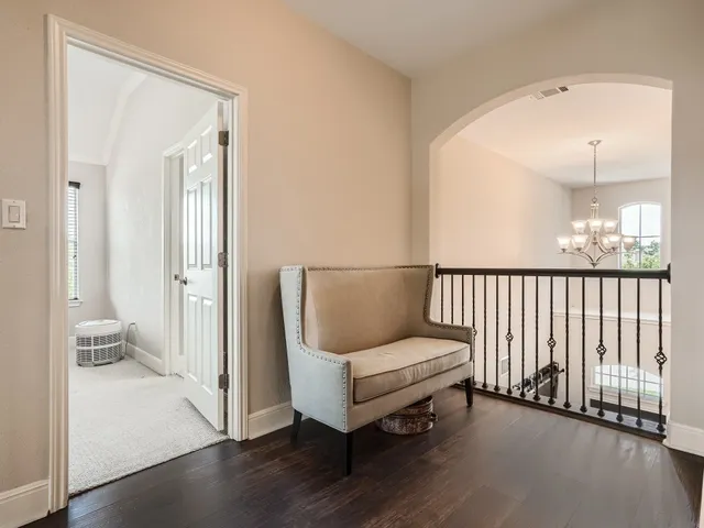 a room with a bed and a window