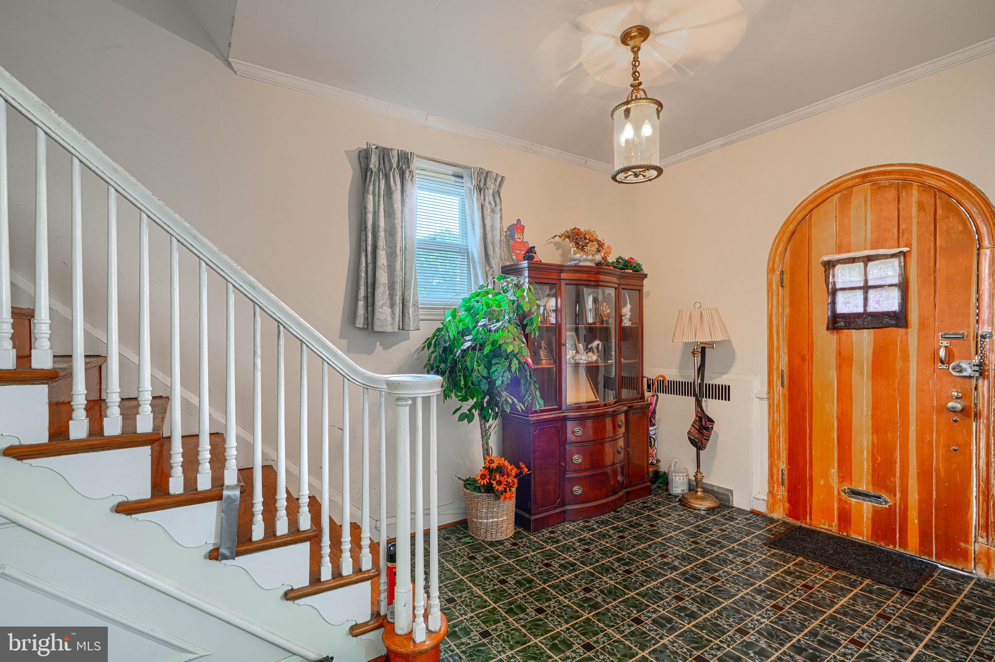 3212 Dorchester Road Baltimore, MD 21215 - Photo 10 of 45 a view of an entryway with wooden floor