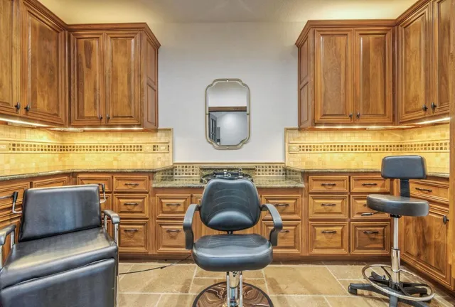 a kitchen with a sink and a stove