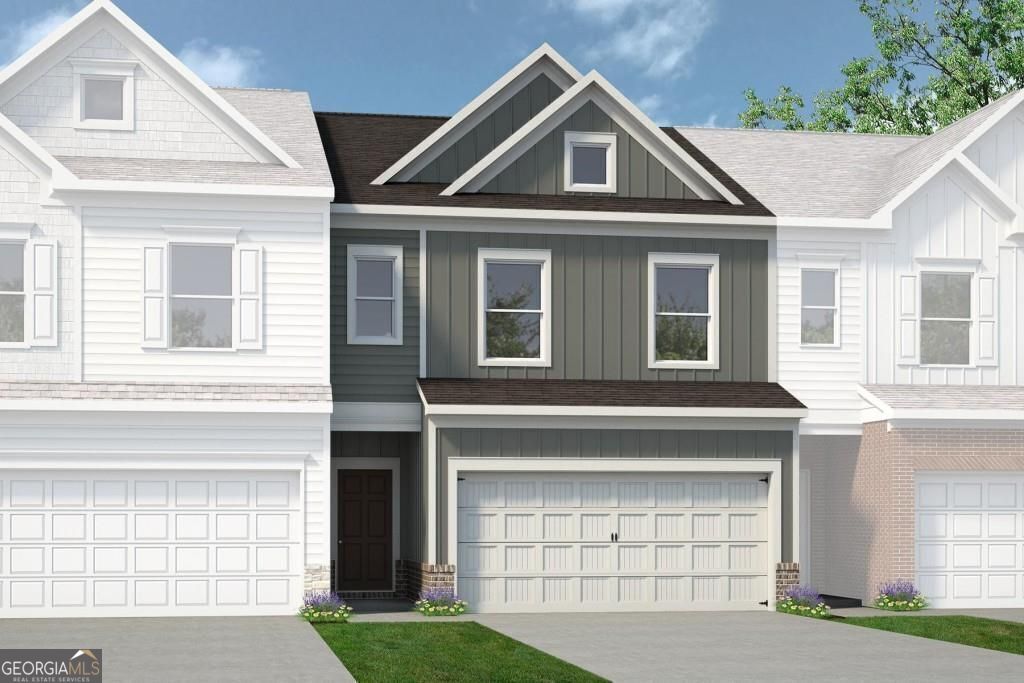 1006 Stiles Circle, Unit 4 Cartersville, GA 30120 - Photo 1 of 1 a front view of a house with a garage