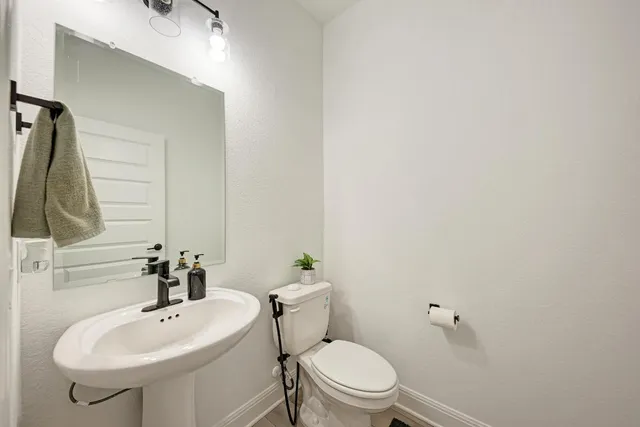 a bathroom with a bathtub and a sink