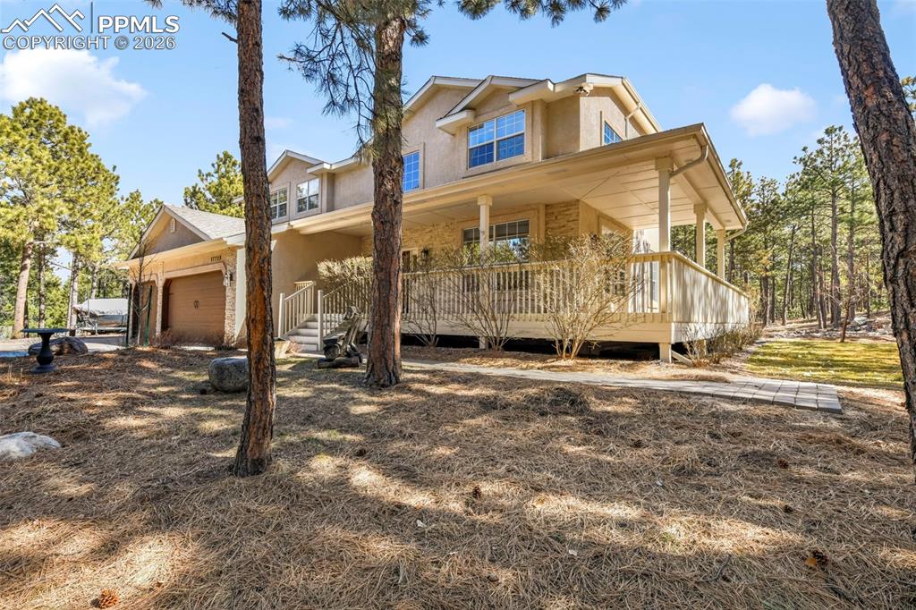 17725 Martingale Road Monument, CO 80132 - Photo 2 of 50 a view of a house with a yard
