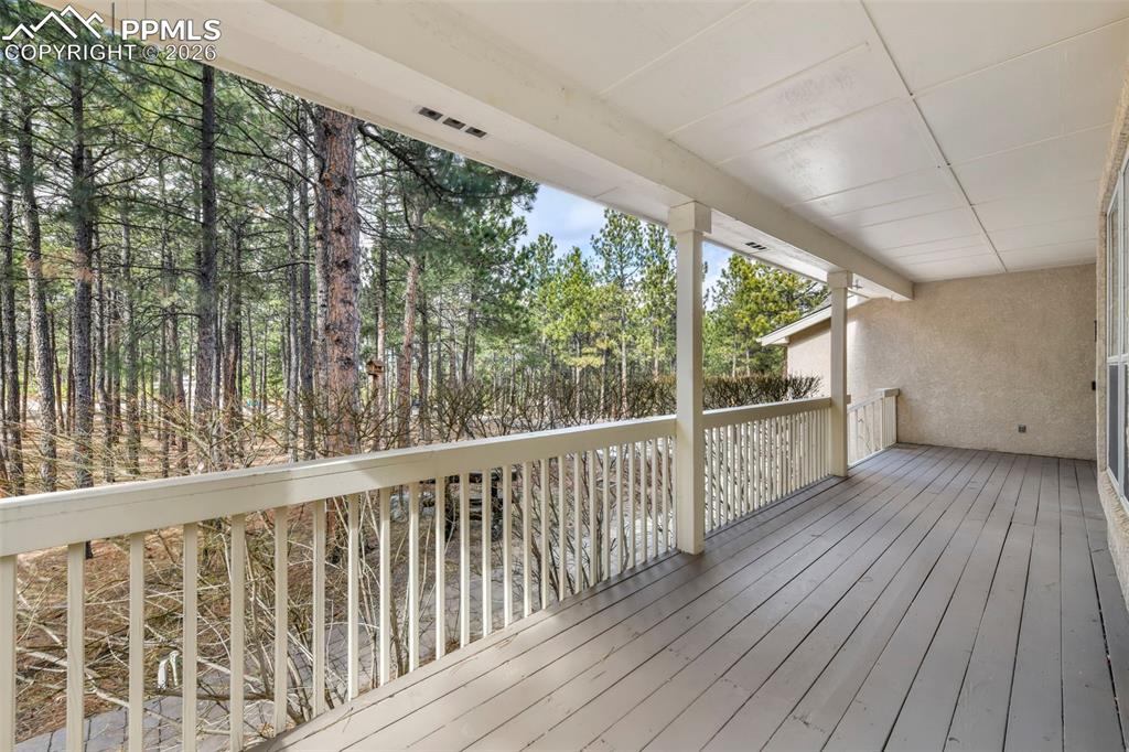 17725 Martingale Road Monument, CO 80132 - Photo 3 of 50 a view of balcony with wooden floor