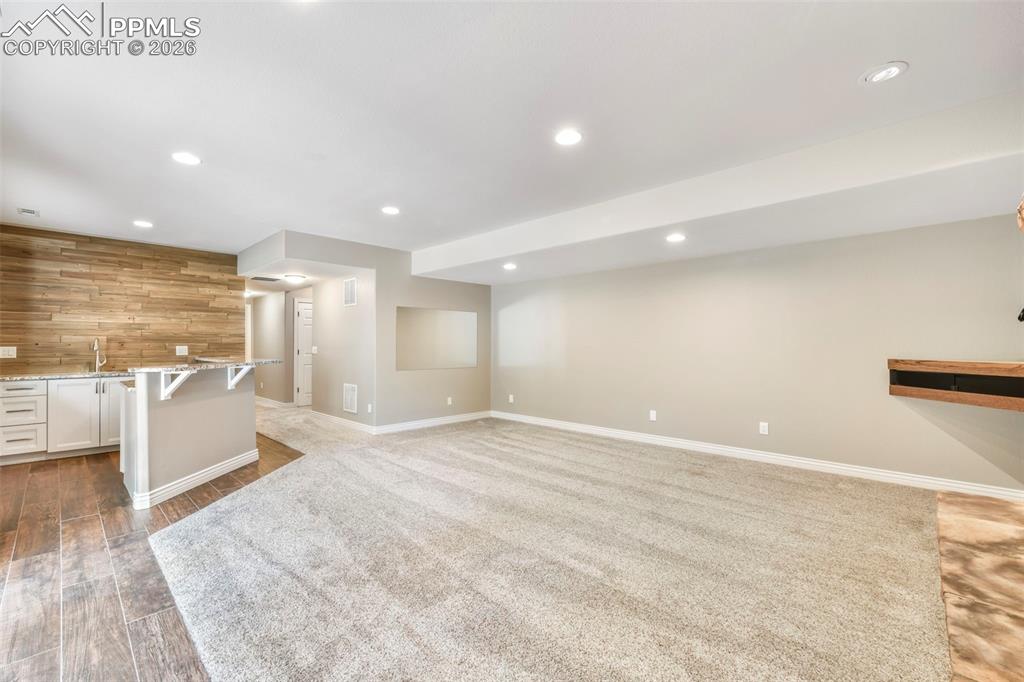 17725 Martingale Road Monument, CO 80132 - Photo 33 of 50 a view of an empty room with wooden floor