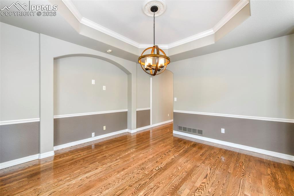 17725 Martingale Road Monument, CO 80132 - Photo 7 of 50 a view of empty room with wooden floor