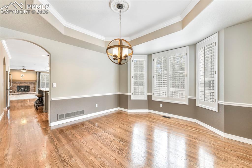 17725 Martingale Road Monument, CO 80132 - Photo 8 of 50 a view of empty room with wooden floor and fan