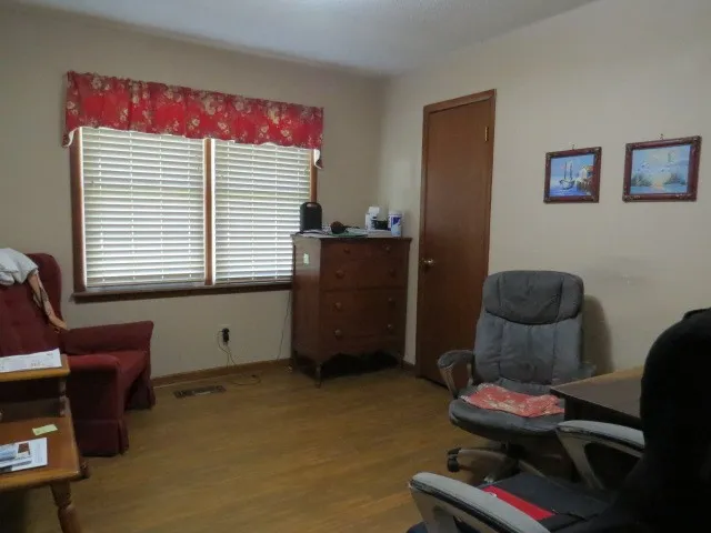 a room with furniture and a window