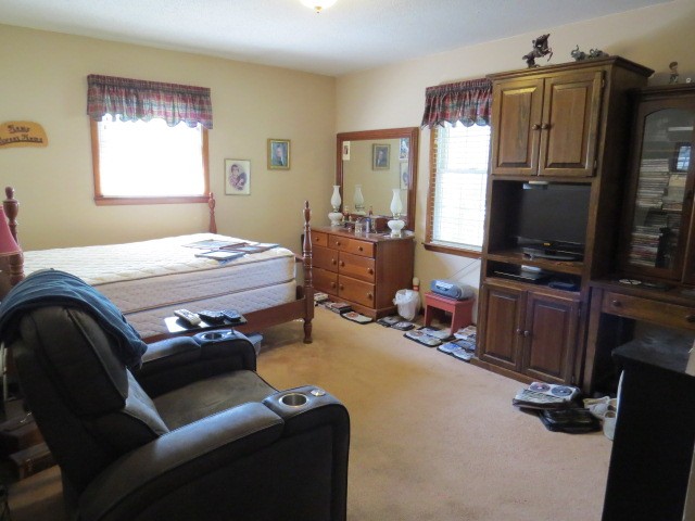 1549 Mill Street Pulaski, TN 38478 - Photo 14 of 24 a bedroom with bed and a tv