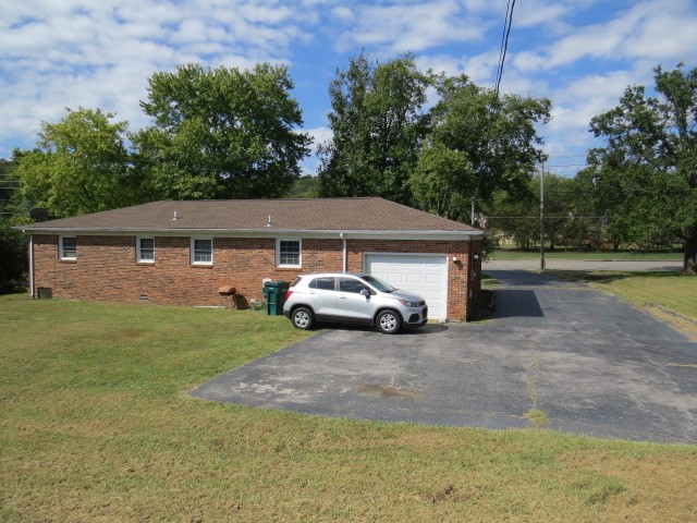 1549 Mill Street Pulaski, TN 38478 - Photo 22 of 24 a car parked in front of house