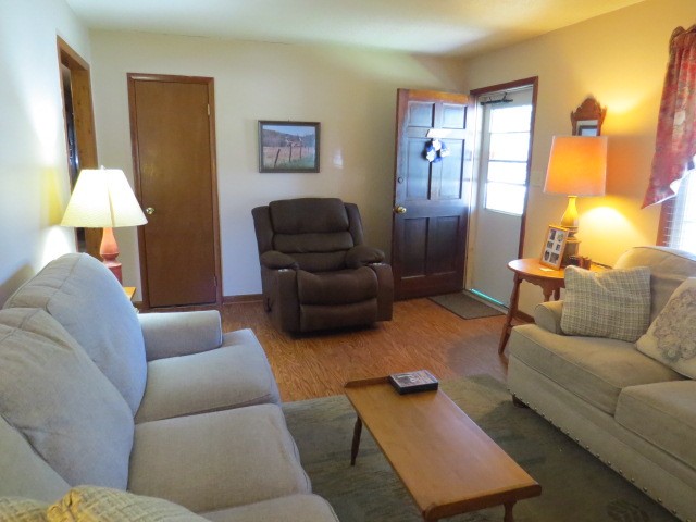 1549 Mill Street Pulaski, TN 38478 - Photo 3 of 24 a living room with furniture and a lamp