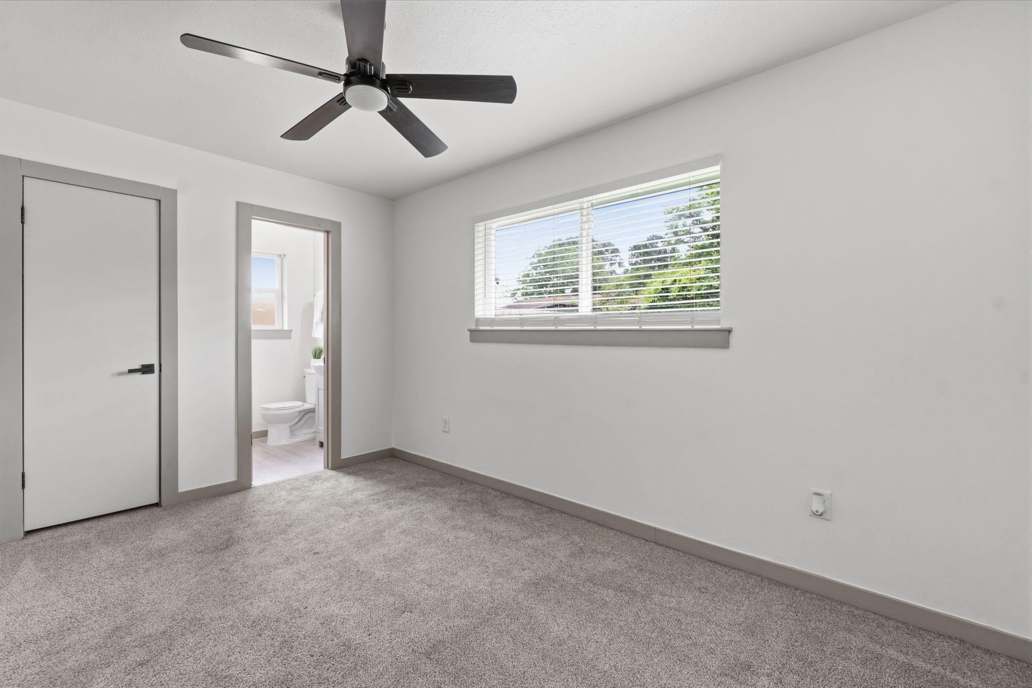 14850 Coaltown Road Willis, TX 77378 - Photo 21 of 41 Large primary suite with generous closet space, modern finishes, and a bright, comfortable layout.