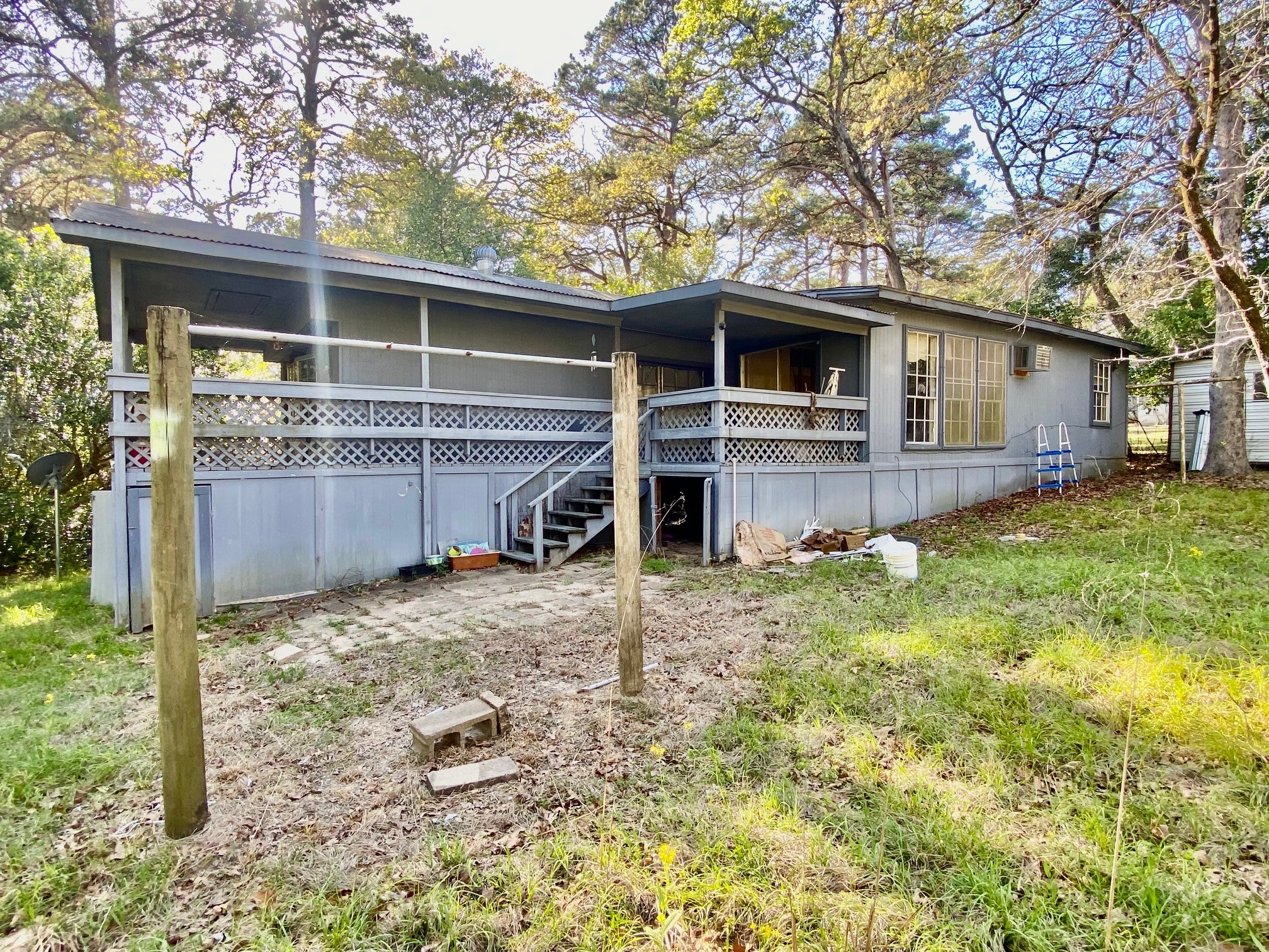 361 Beaver Run Grapeland, TX 75844 - Photo 10 of 12 a front view of a house with a yard