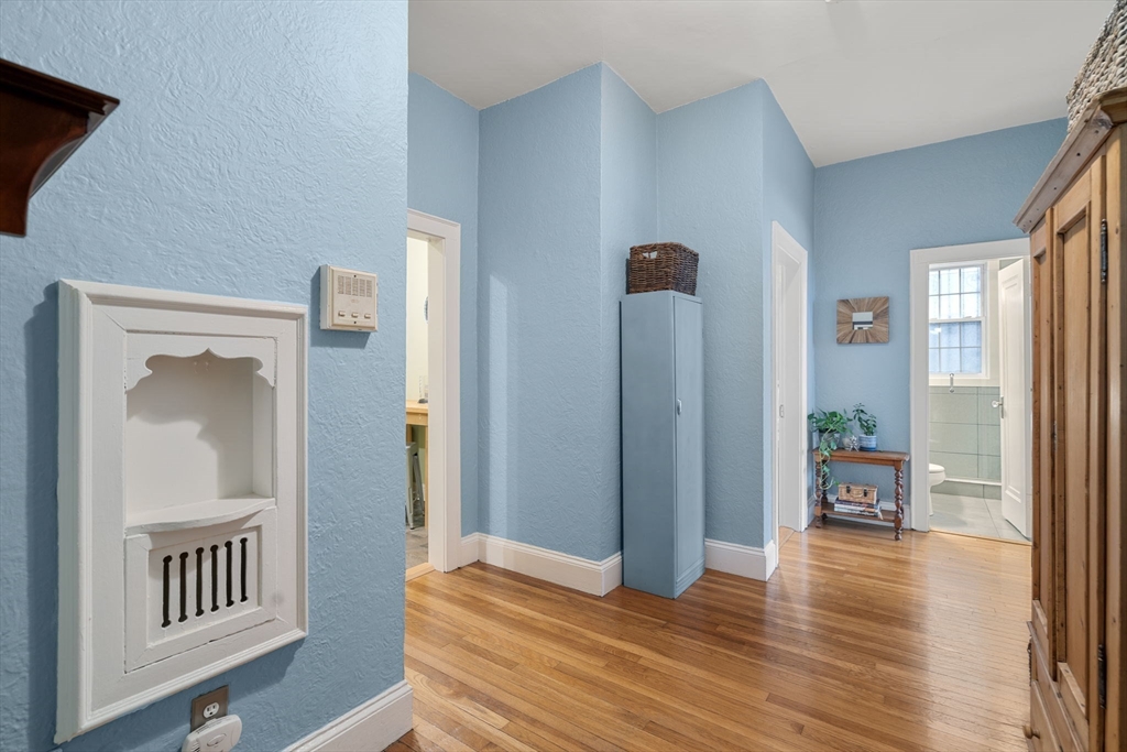 90 Kilsyth Road, Unit 2 Boston, MA 02135 - Photo 12 of 18 a view of livingroom with furniture and wooden floor