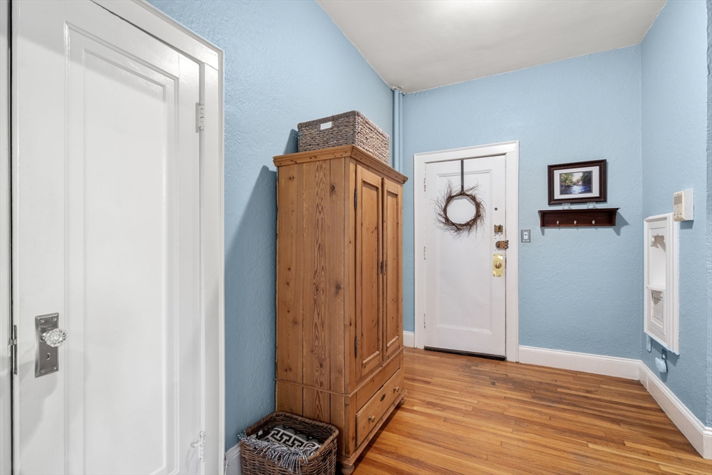 90 Kilsyth Road, Unit 2 Boston, MA 02135 - Photo 13 of 18 a view of empty room with wooden floor