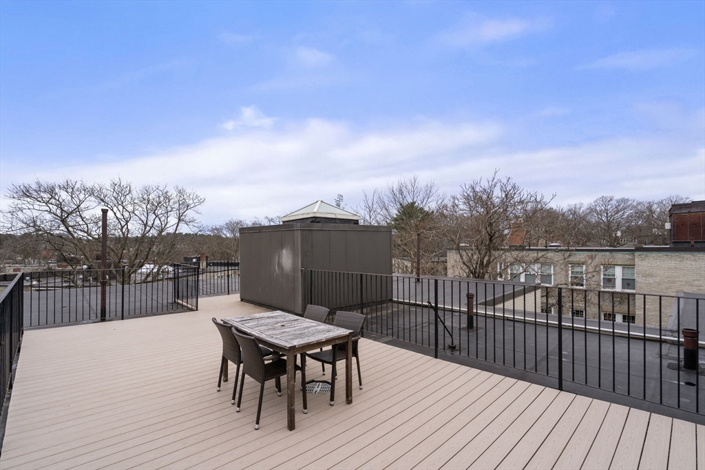 90 Kilsyth Road, Unit 2 Boston, MA 02135 - Photo 17 of 18 a view of a terrace with furniture