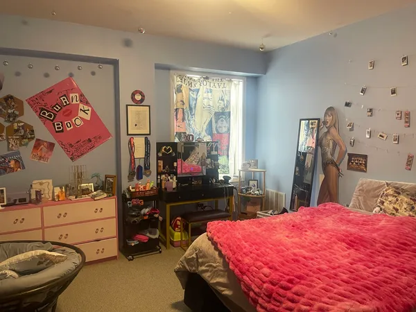 a bathroom with a sink mirror and toilet