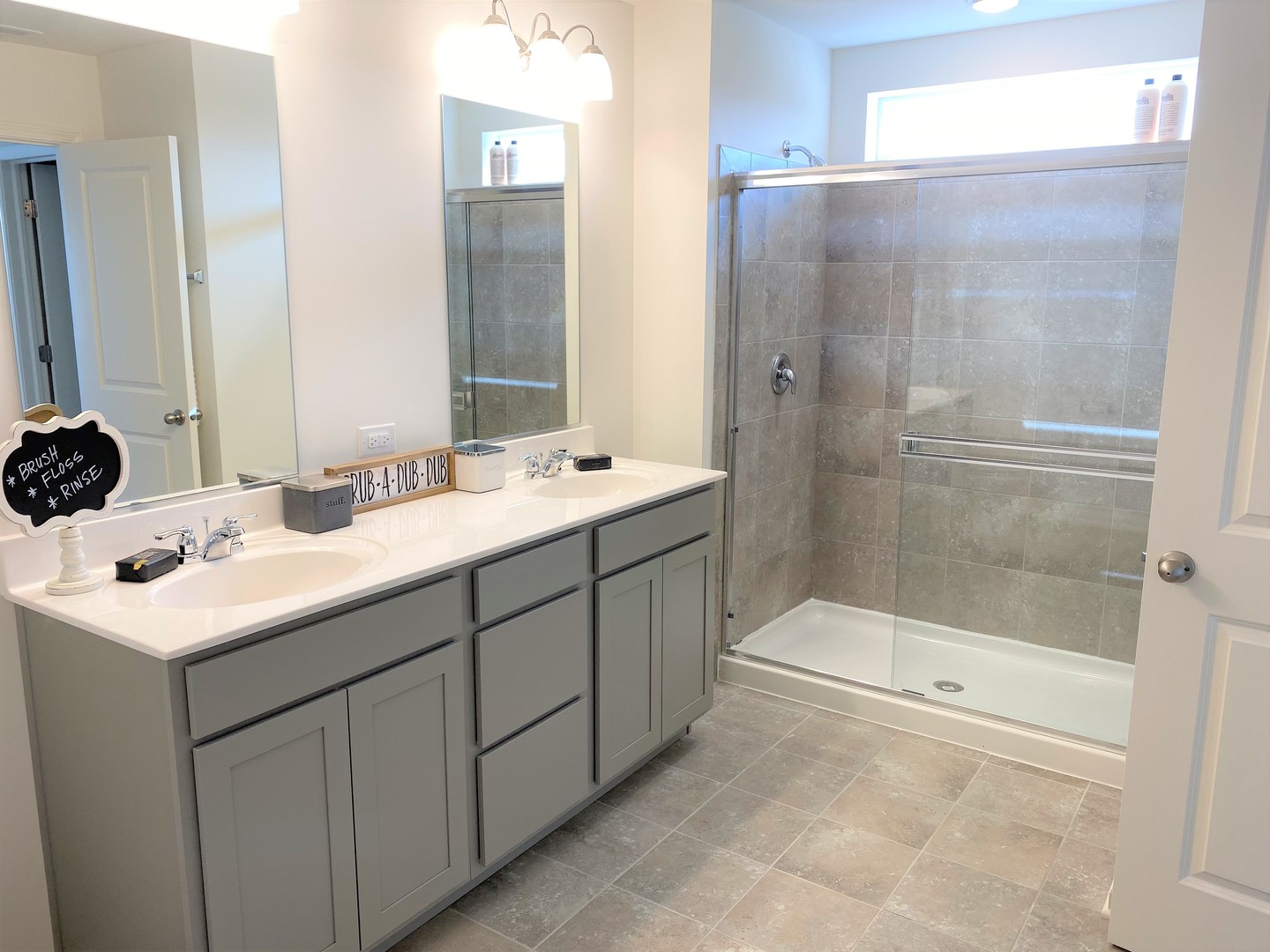 2035 Rownham Hill Road New Lenox, IL 60451 - Photo 14 of 15 a bathroom with a sink and a mirror
