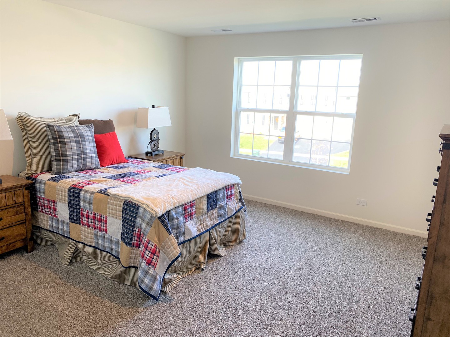 2035 Rownham Hill Road New Lenox, IL 60451 - Photo 9 of 15 a bedroom with a bed lamp and window
