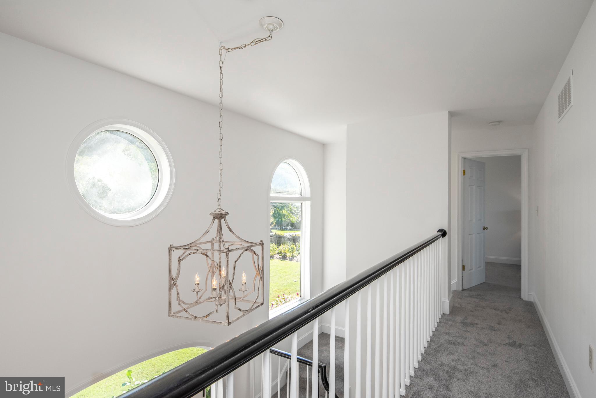 1094 River Bay Road Annapolis, MD 21409 - Photo 61 of 101 2 story walkway to bedrooms
