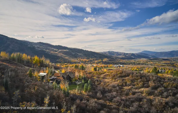 a view of lake and mountain