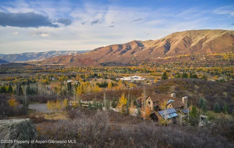 a view of a lake with mountains in the background