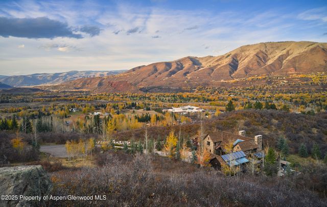 a view of a lake with mountains in the background