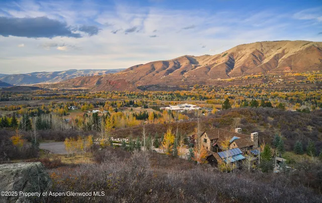 a view of a lake with mountains in the background