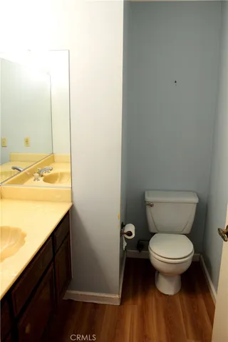 a bathroom with a toilet and a sink