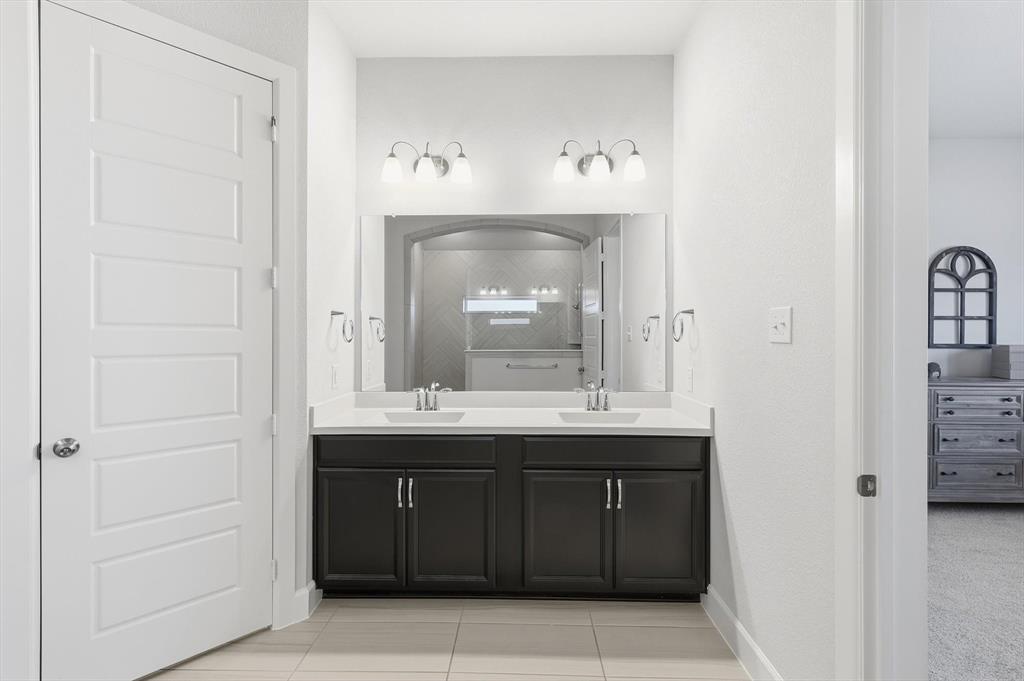 1701 Shetland Road Aubrey, TX 76227 - Photo 12 of 34 Freshly painted, double vanity, private water closet.