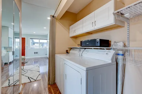 a kitchen view with stainless steel appliances a stove and a refrigerator
