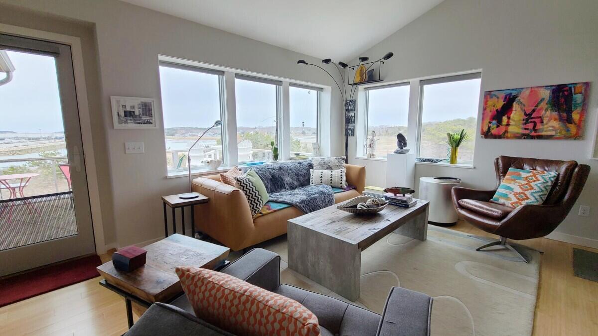 75 Richman Lane Wellfleet, MA 02667 - Photo 13 of 72 a living room with furniture and a window