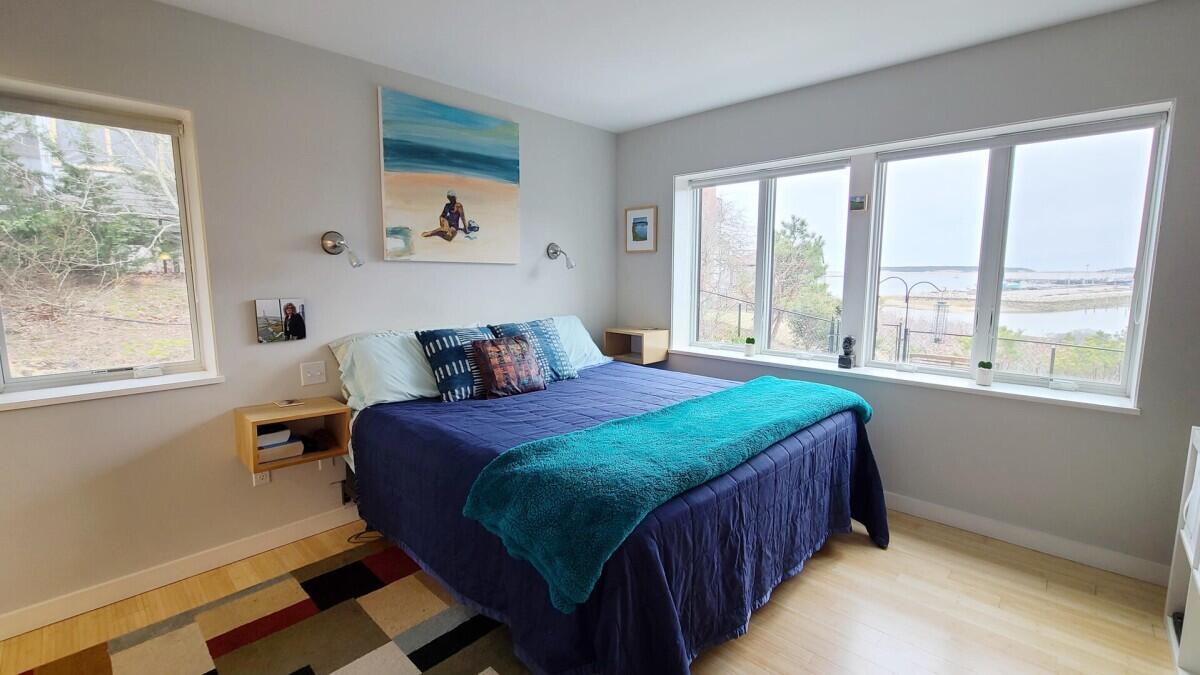 75 Richman Lane Wellfleet, MA 02667 - Photo 17 of 72 a bedroom with a bed and window