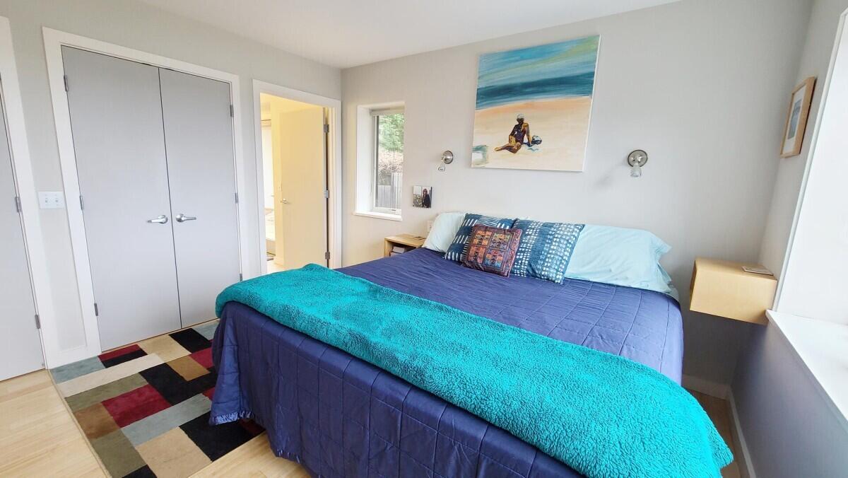 75 Richman Lane Wellfleet, MA 02667 - Photo 18 of 72 a bedroom with a bed and a window