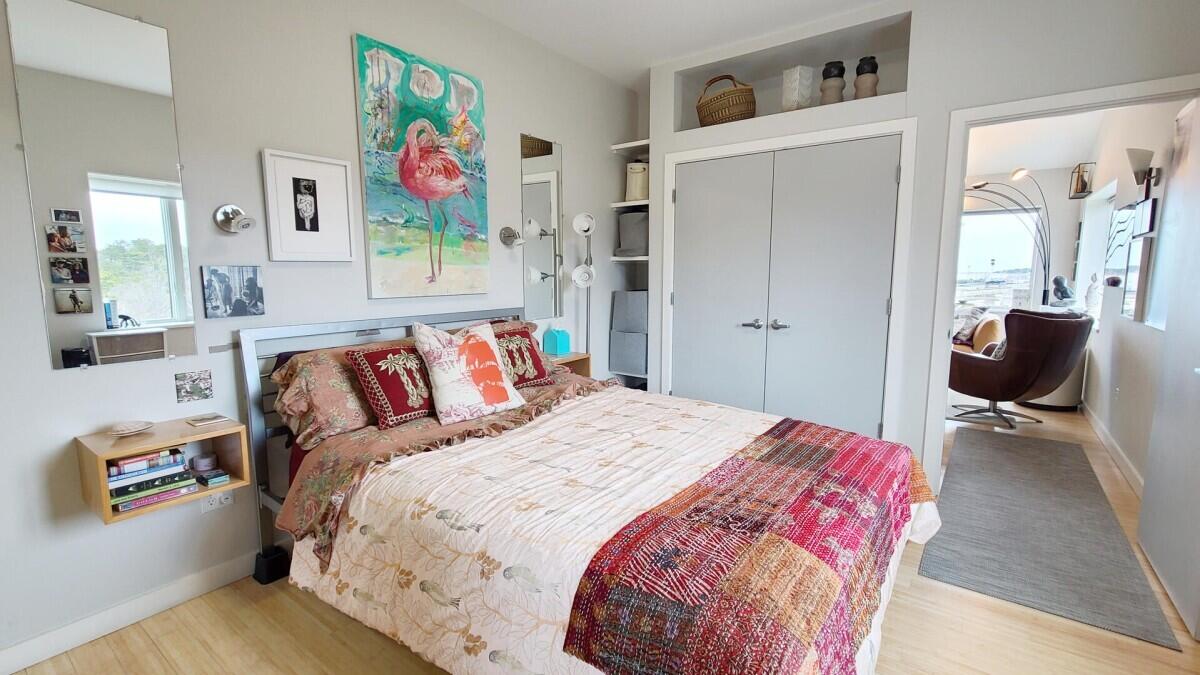 75 Richman Lane Wellfleet, MA 02667 - Photo 23 of 72 a bedroom with a bed and a couch