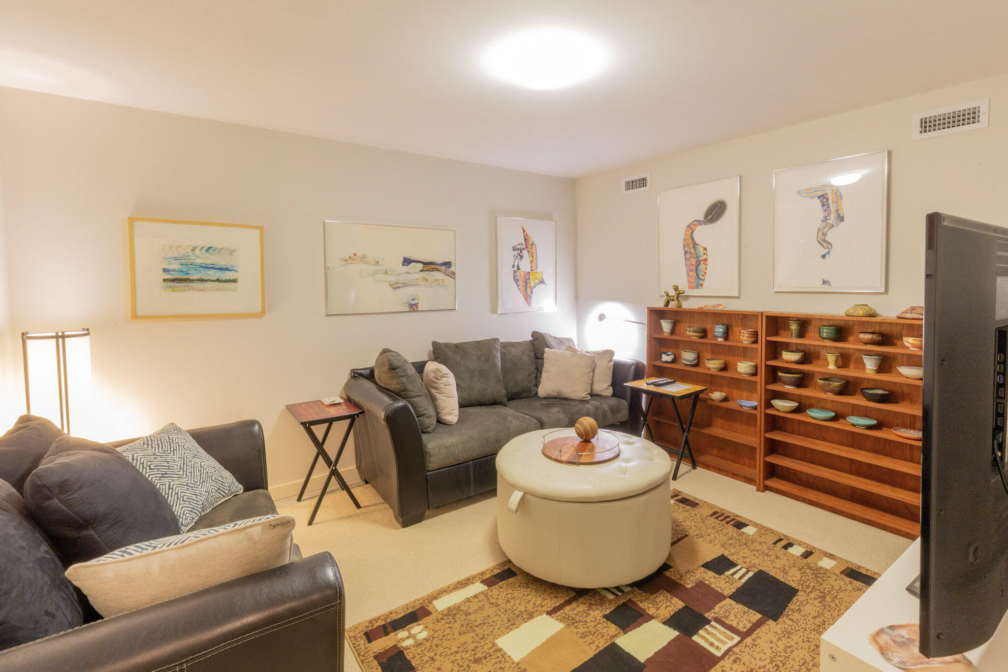 75 Richman Lane Wellfleet, MA 02667 - Photo 32 of 72 a living room with furniture and a painting on the wall
