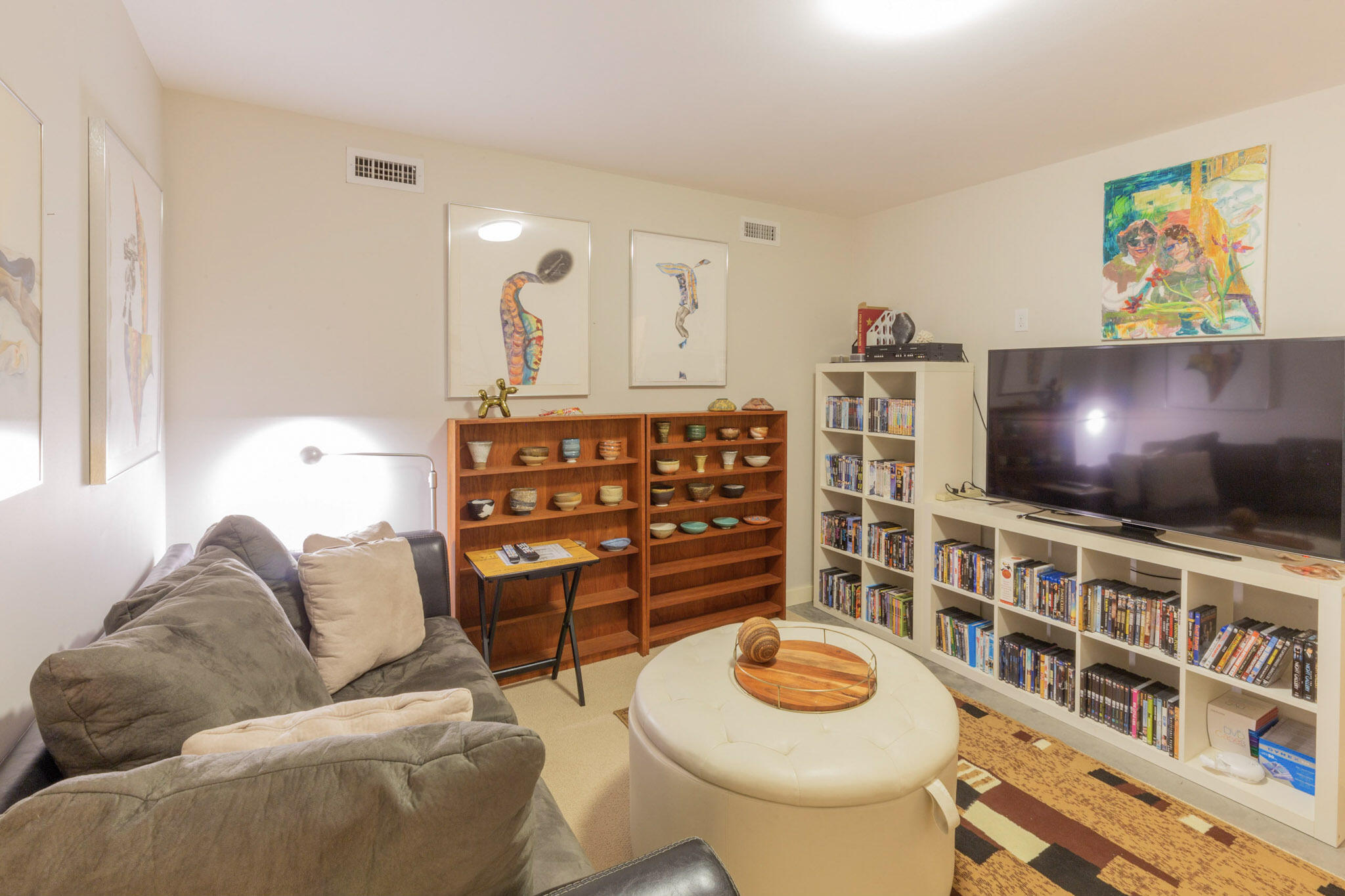 75 Richman Lane Wellfleet, MA 02667 - Photo 33 of 72 a living room with furniture and a flat screen tv