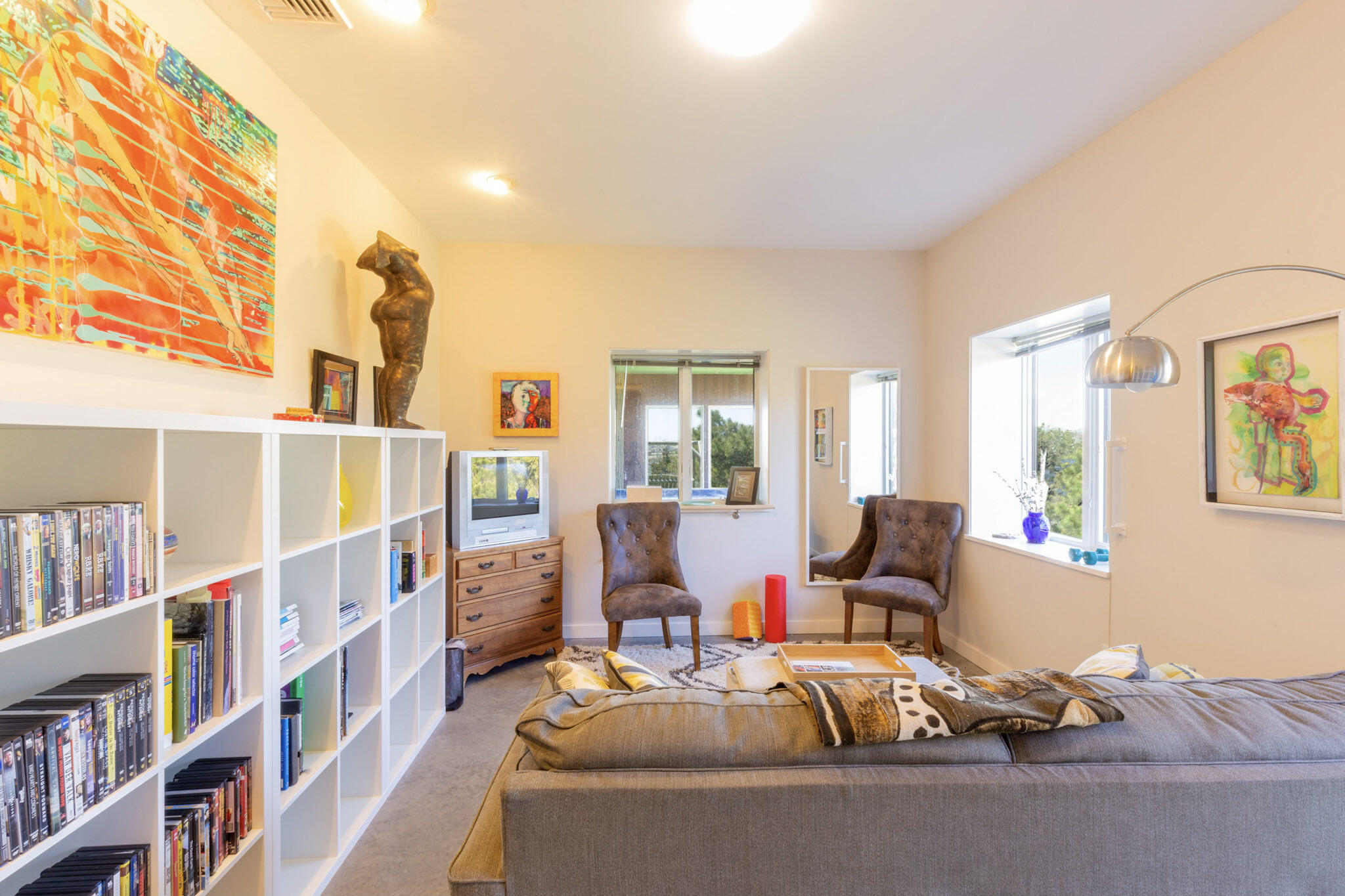 75 Richman Lane Wellfleet, MA 02667 - Photo 38 of 72 a living room with furniture and a book shelf