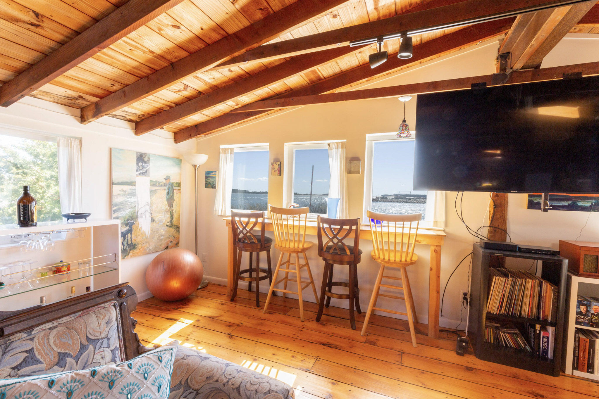 75 Richman Lane Wellfleet, MA 02667 - Photo 47 of 72 a living room with lots of furniture and a flat screen tv