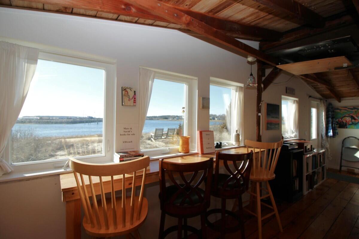 75 Richman Lane Wellfleet, MA 02667 - Photo 48 of 72 a view of a dining room with furniture window and outside view