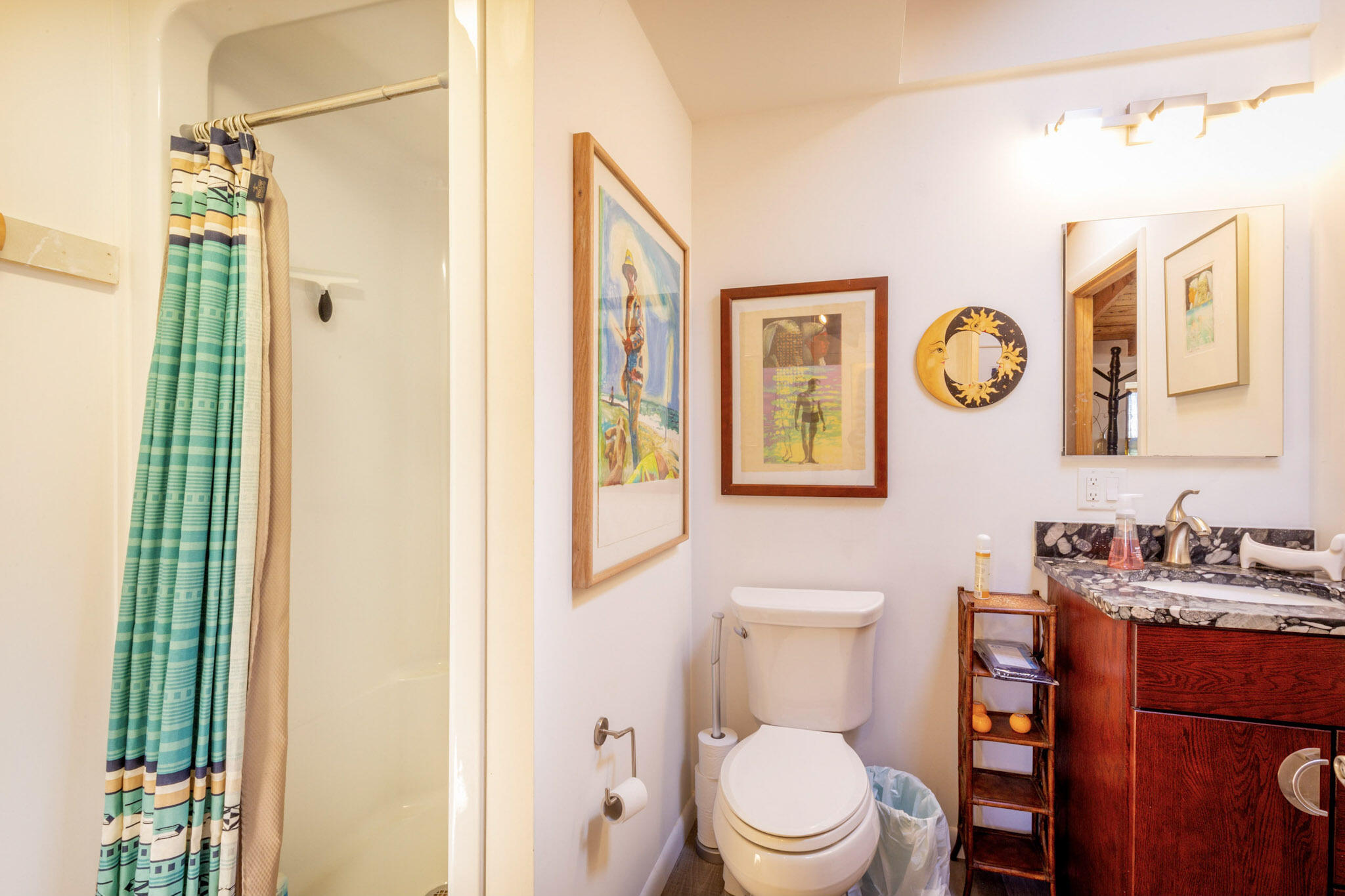 75 Richman Lane Wellfleet, MA 02667 - Photo 57 of 72 a bathroom with a toilet a sink and a shower curtain