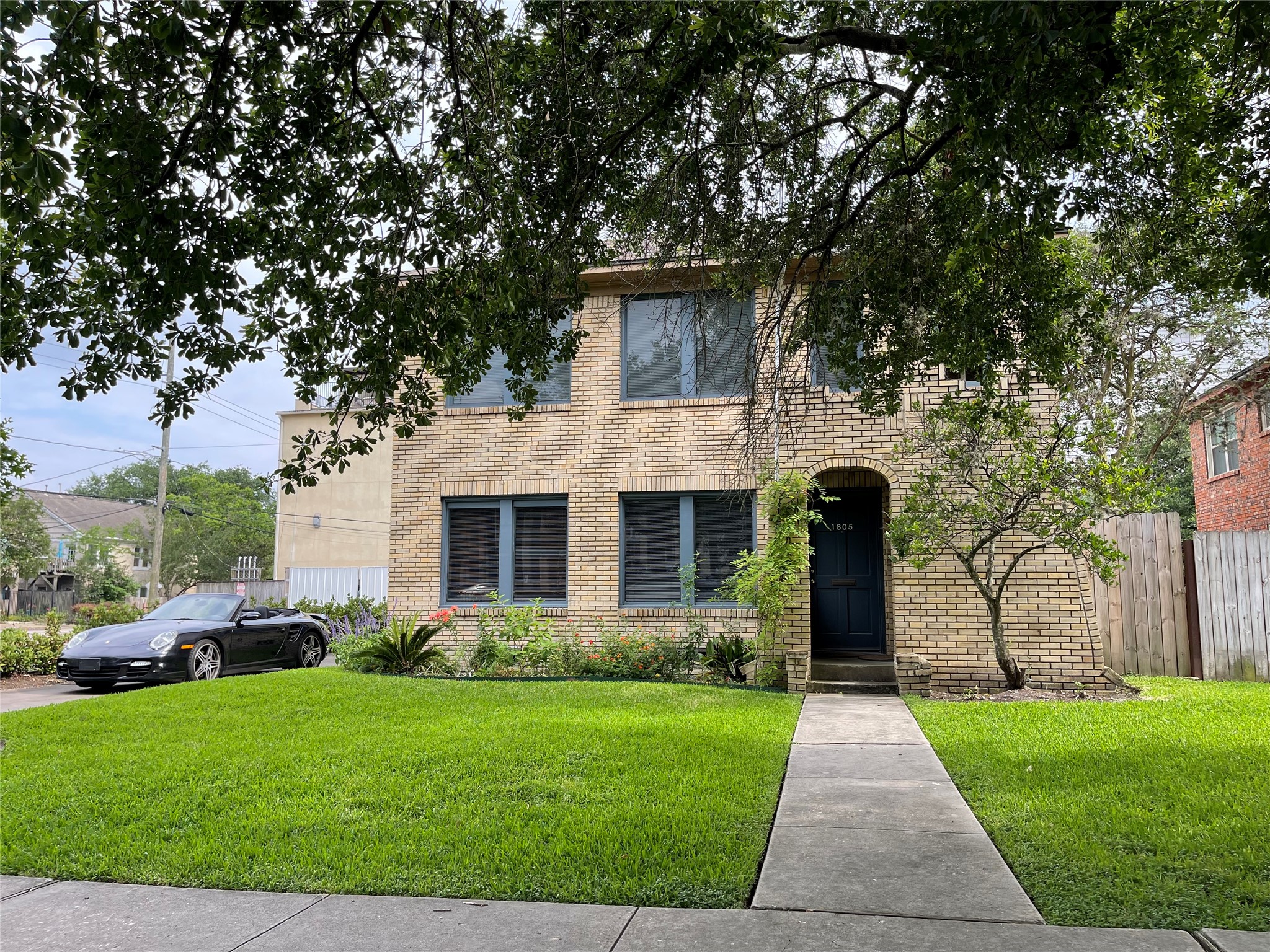 1805 Sul Ross Street Houston, TX 77098 - Photo 11 of 21 a front view of house with yard and green space