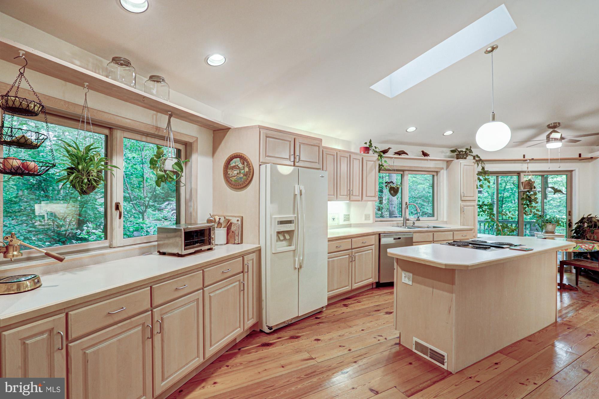 75 Good Hope Road Landenberg, PA 19350 - Photo 20 of 65 a kitchen with sink refrigerator and large window