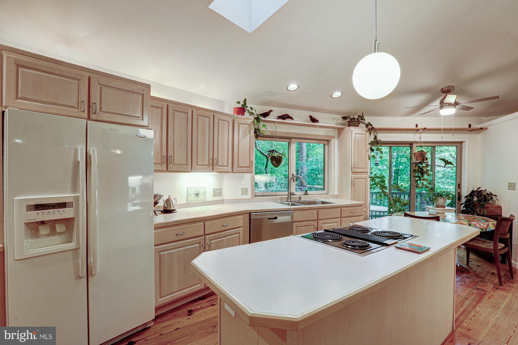 75 Good Hope Road Landenberg, PA 19350 - Photo 21 of 65 a kitchen with a stove a refrigerator and a sink