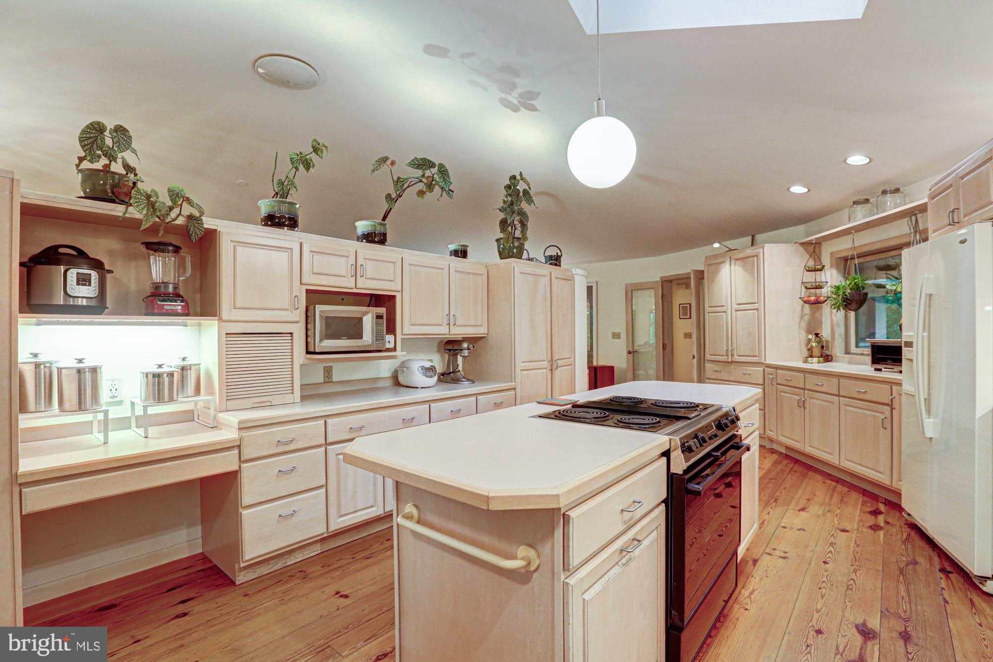 75 Good Hope Road Landenberg, PA 19350 - Photo 23 of 65 a kitchen that has a sink a stove and chairs
