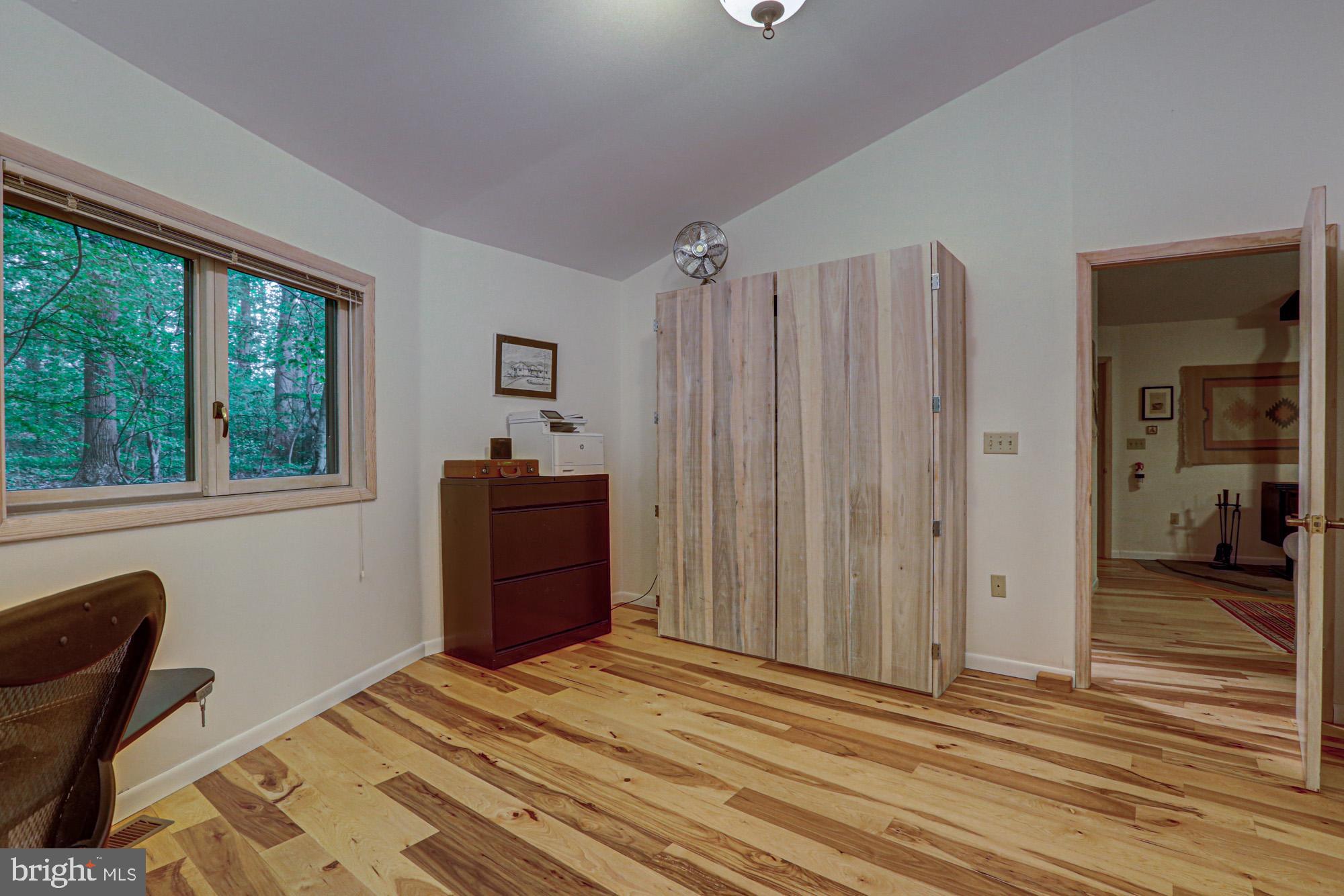 75 Good Hope Road Landenberg, PA 19350 - Photo 51 of 65 a view of a bedroom with wooden floor and a window