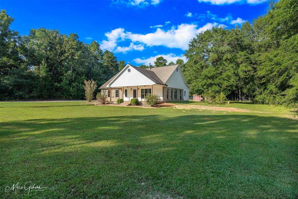 550 Linton Bellevue Road Benton, LA 71006 - Photo 1 of 37 View of front featuring porch and front yard