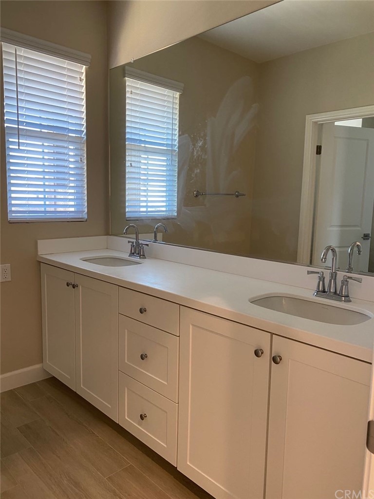 63 Singer Irvine, CA 92620 - Photo 22 of 33 a bathroom with a sink and a window